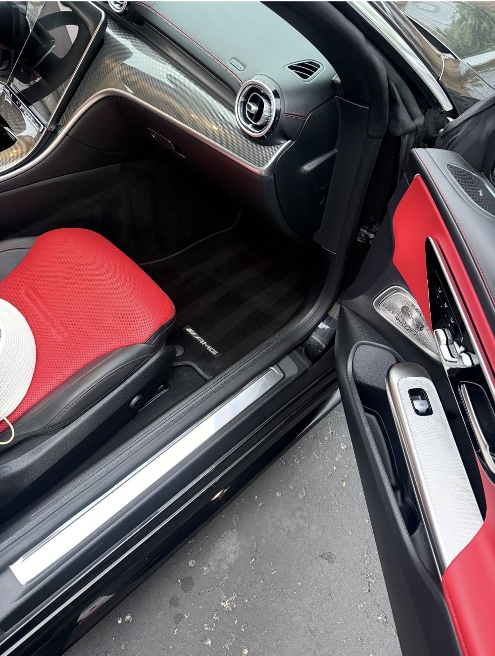 Mercedes-AMG door sill and red seat after detailing