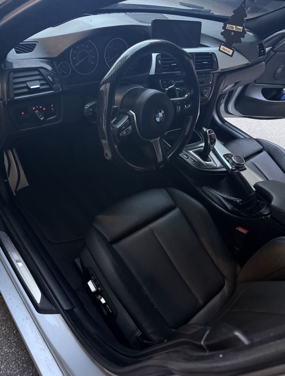 BMW 4 Series driver seat and dash after detailing